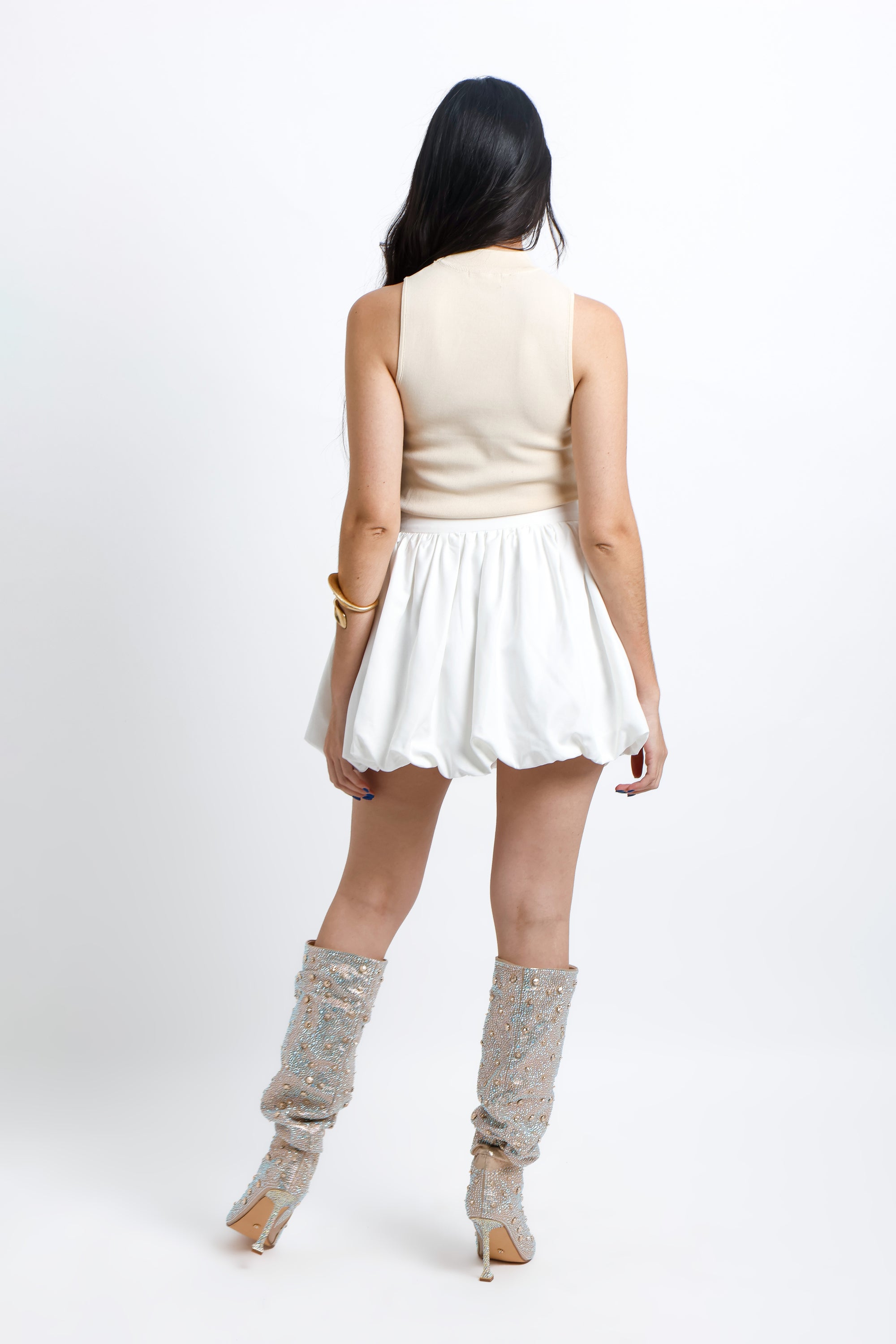 Blusa sin mangas en tono crema